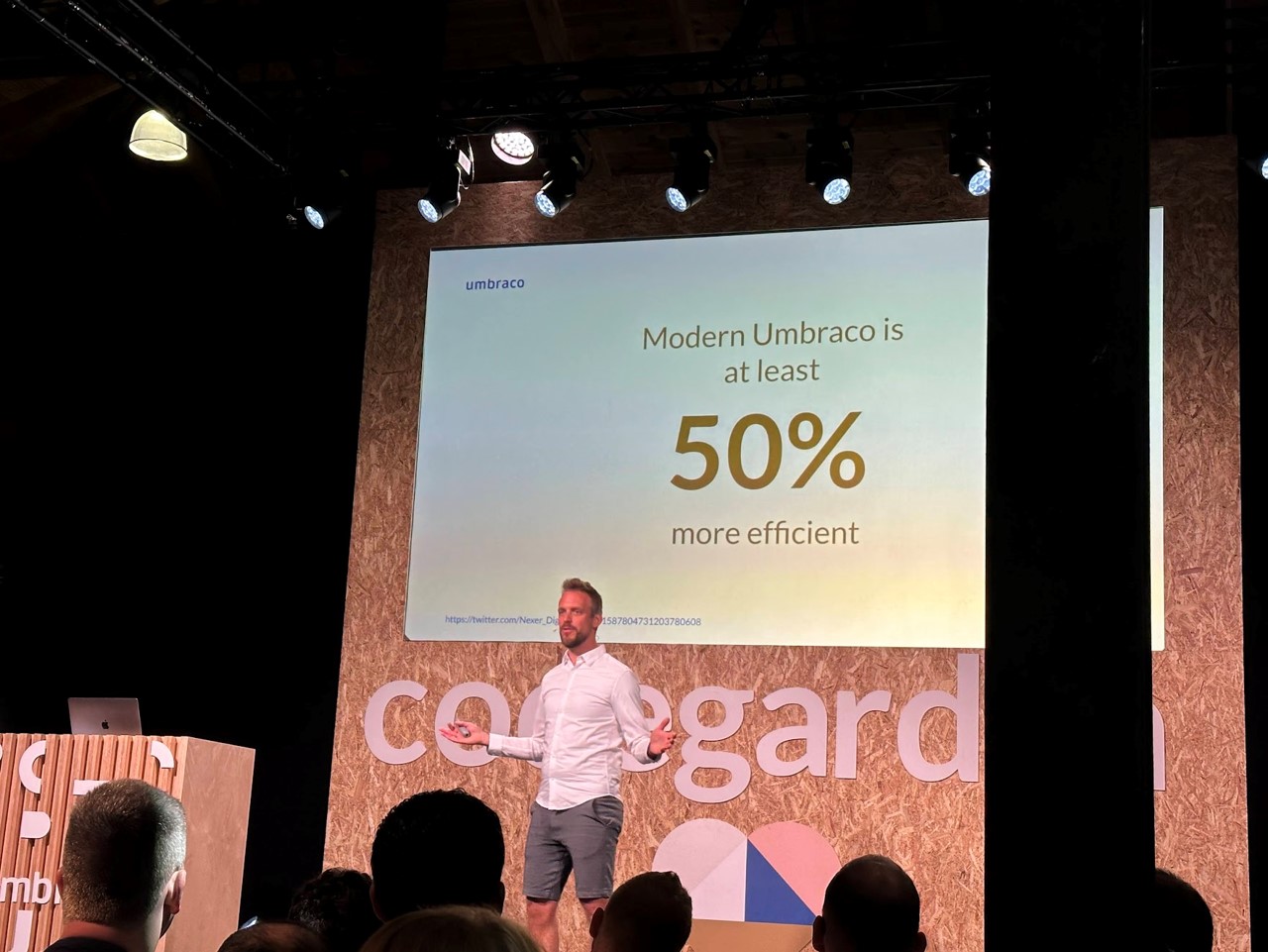 A photo taken at Codegarden 2023 with a slide noting "Modern Umbraco is at least 50% more efficient"